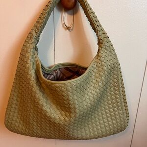 Elegant woven Vegan leather bag